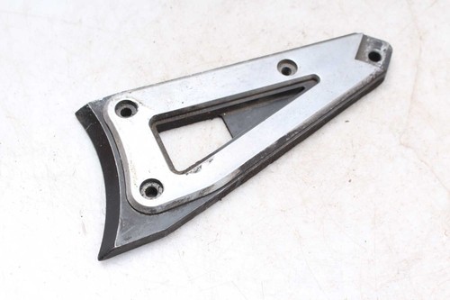 Footrest retaining plate left