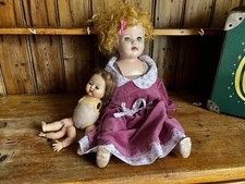 Antique dolls 2 dolls found in attic in an old laundry box