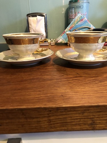 Tea cups and saucers - and,