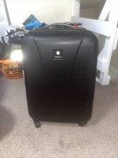 Tripp Black 4-Wheel Hard Shell