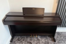 Yamaha Arius YDP-145 digital piano in satin black finish 