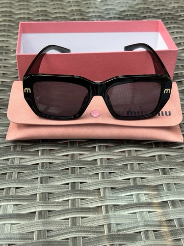 Miu black gold sunglasses - black,