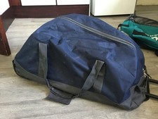 Big strong hold-all with wheels and pull along handle, 27x12x12 inch 