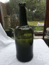 Antique free blown sagged base