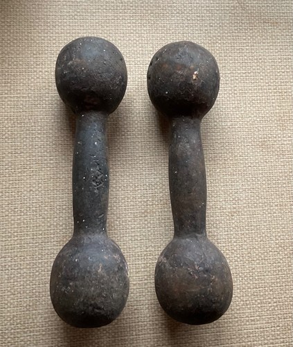 Antique cast metal dumbbells - metal,