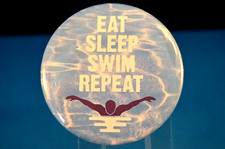 "EAT SLEEP SWIM REPEAT" BUTTON