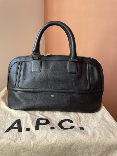 Black leather hand bag - hand,