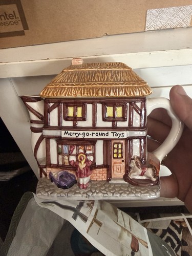 Merry round toys - toys", teapot