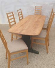 A Large Ercol Elm Refectory Dining Table