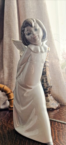 Lladro curious angel - curious, with