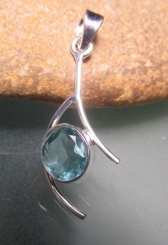 Sterling silver faceted oval