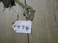 ANTIQUE BRASS ESCUTCHEON