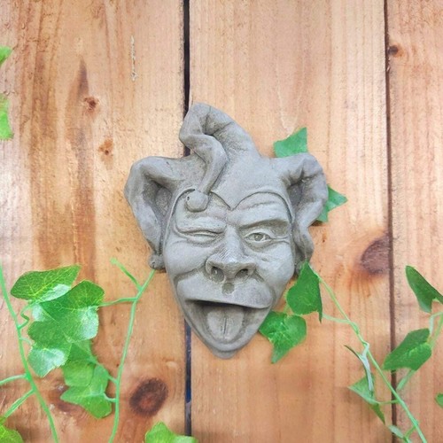 Jester face stone wall plaque - face,