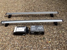 THULE EVO ALUMINIUM QUICK WING BARS AND 753 RAPID FOOT SYSTEM FOR BMW