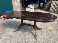 Vintage Brown Wood Oval Extending Double Pedestal Dining Table Claw Feet Wheels