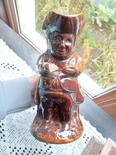 19 th Century Rockingham Treacle Glazed Pottery Toby Jug.   26 cm x 19 cm