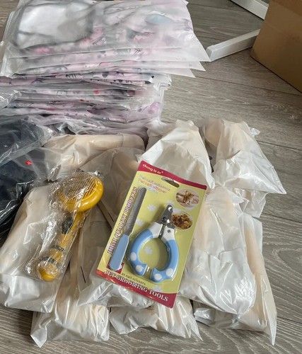 Joblot dog raincoats brushes - joblot,