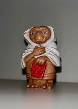 ET Figure holding Speak &