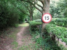 Photo 6x4 Footpath and road to