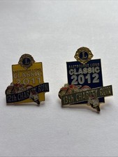 Two Lions Club Metal Badges