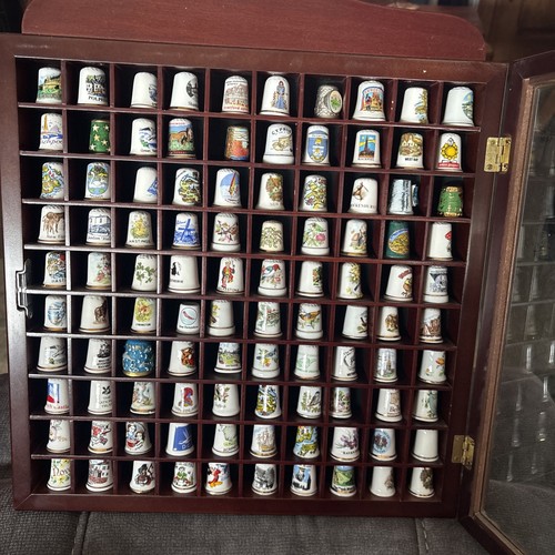 100 thimbles from places - 100,