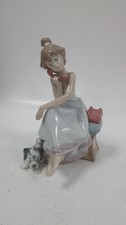 Lladro Style Porcelain Girl Figurine on Phone with Dog Ornament