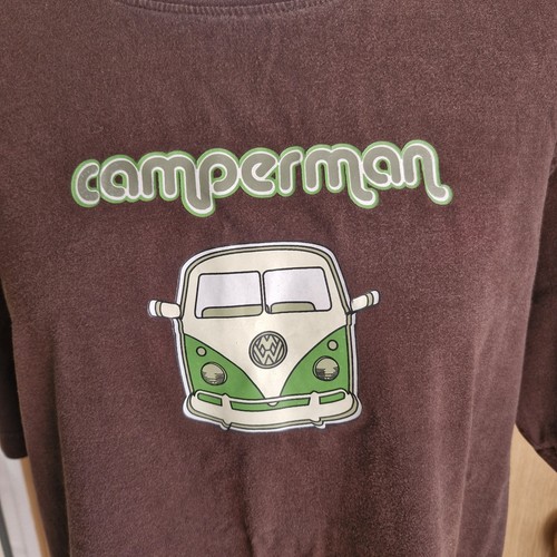 Shirt features graphic - a, of