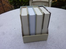 PEBBLES 4 NOTEBOOKS IN CASE. NOTEBOOK SIZE 11.2cms x  7.7cms.