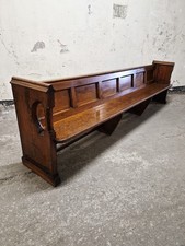 Antique solid church - pew, monks