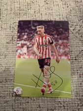  Harrison Jones Signed A4