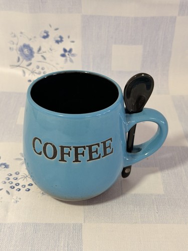 Large teal coffee mug with - coffee,