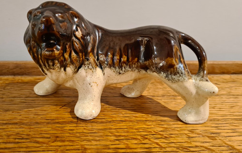 Brown ceramic pottery - ceramic/pottery, roaring