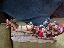 Family in horse drawn sleigh vintage plays  we wish you a merry christmas