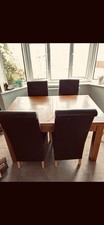 CHUNKY SOLID OAK EXTENDING DINING TABLE & EIGHT  BLACK FAUX LEATHER CHAIRS .. 