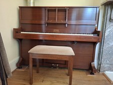 Vintage Upright Steck Pianola in working condition, includes stall and 70 rolls