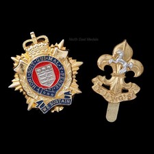 Two 'Ammo UK' Made Badges