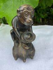 Metal Bronze Chinese Zodiac Monkey Statue sitting on corn holding a Yuanboa