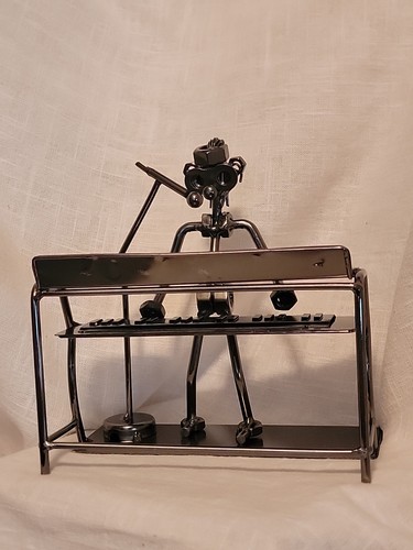 Keyboard singer nuts and - and, bolts