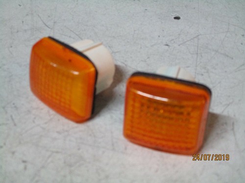 Pair side arrow headlights - of,