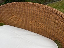 A pretty pair of Small Wicker Settees with seat cushion