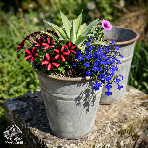 Planters two small galvanised - two,