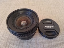Nikon AF Nikkor 20mm f2.8 D fast prime lens, with lens cap, hood and box.