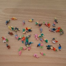 50 + Unbranded N Gauge N Scale Seated Figures.  Look carefully at pictures 