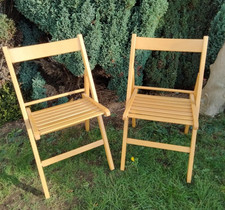 Matching pair of wooden folding kitchen chairs