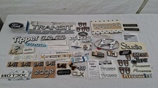NEW OLD STOCK JOB LOT GENUINE ASSORTED CAR BADGES EMBLEMS DECALS VARIOUS MODELS.