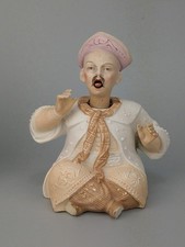 Antique nodder figurine