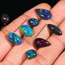 Black opal cabochon lot Black