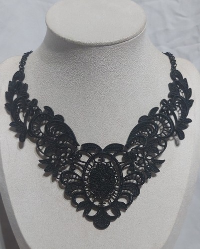 Eye catching black metal bib - black,