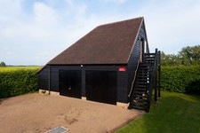 British Columbian Pine garage doors side hinged used - 2 pairs with 1 frame