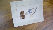 Handmade cross stitch card  of teddy with goose. Approx 20 cm x 13 cm. Blank 